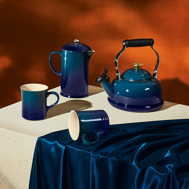 Le Creuset agave ceramic coffee french press, kettle, and mugs.