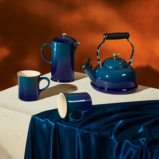 Le Creuset agave ceramic coffee french press, kettle, and mugs.