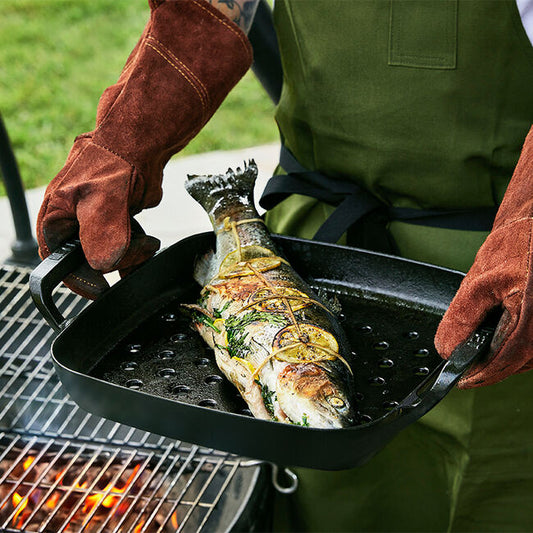 Le Creuset cast iron skillet with ergonomic handles.